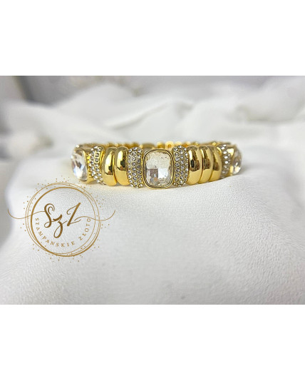 Bransoletka sztywna na gumce duże oczka stal szlachetna pozłacana