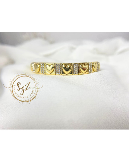 Bransoletka sztywna na gumce serca stal szlachetna pozłacana